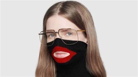 gucci black sweater with red lips|Gucci controversy.